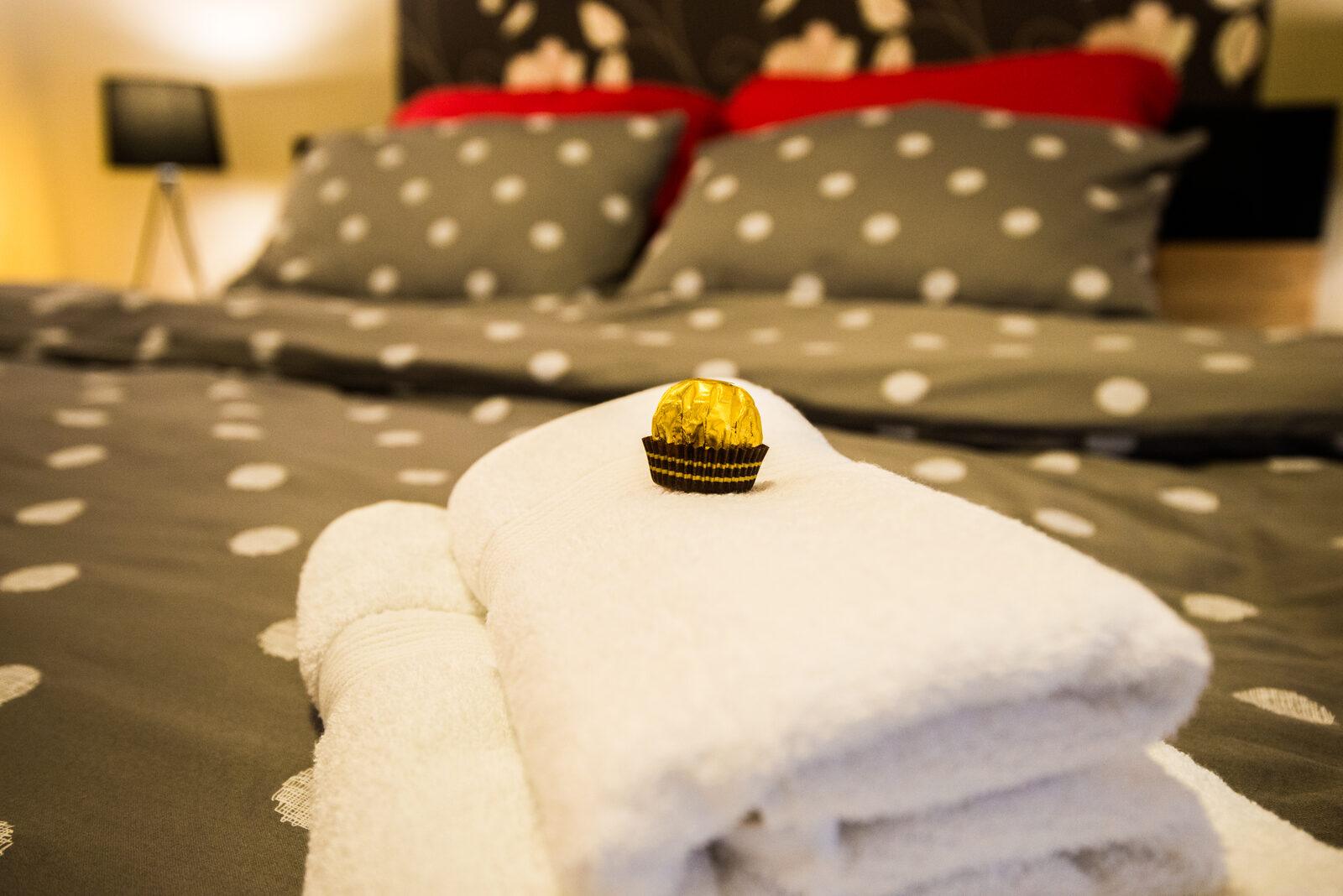 Detail of the bed with towels laid out